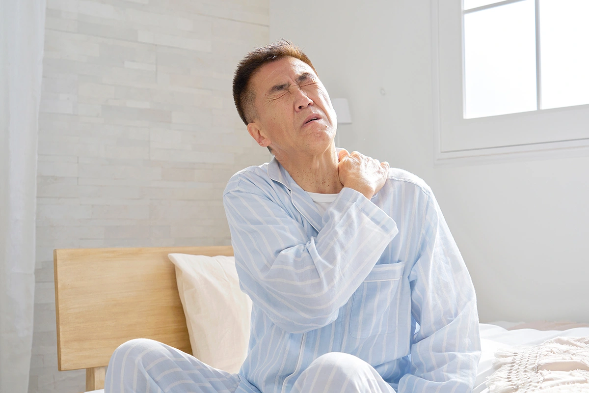 A man suffering from shoulder pain