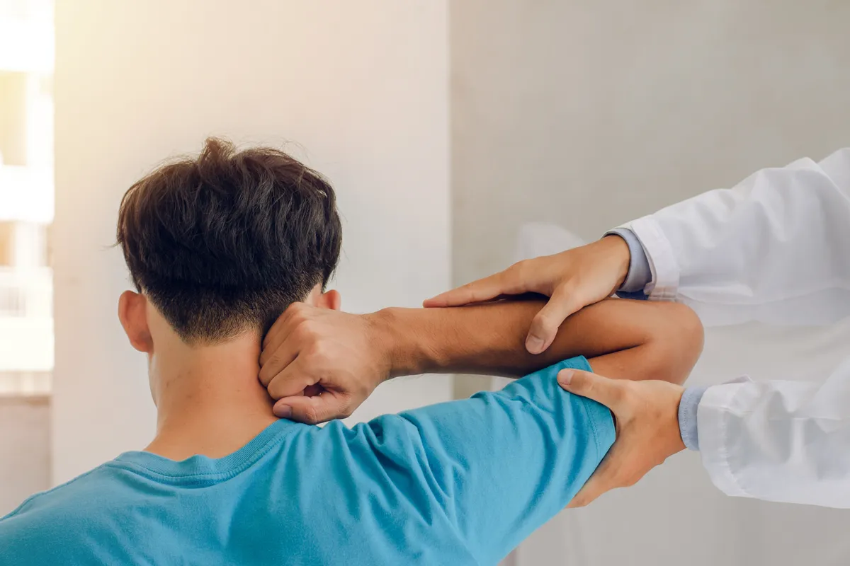 A patient recovering from rotator cuff surgery